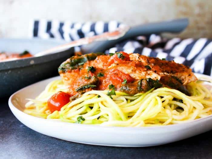 Creamy Tomato Basil Skillet Chicken by The Whole Cook horizontal with zoodles side