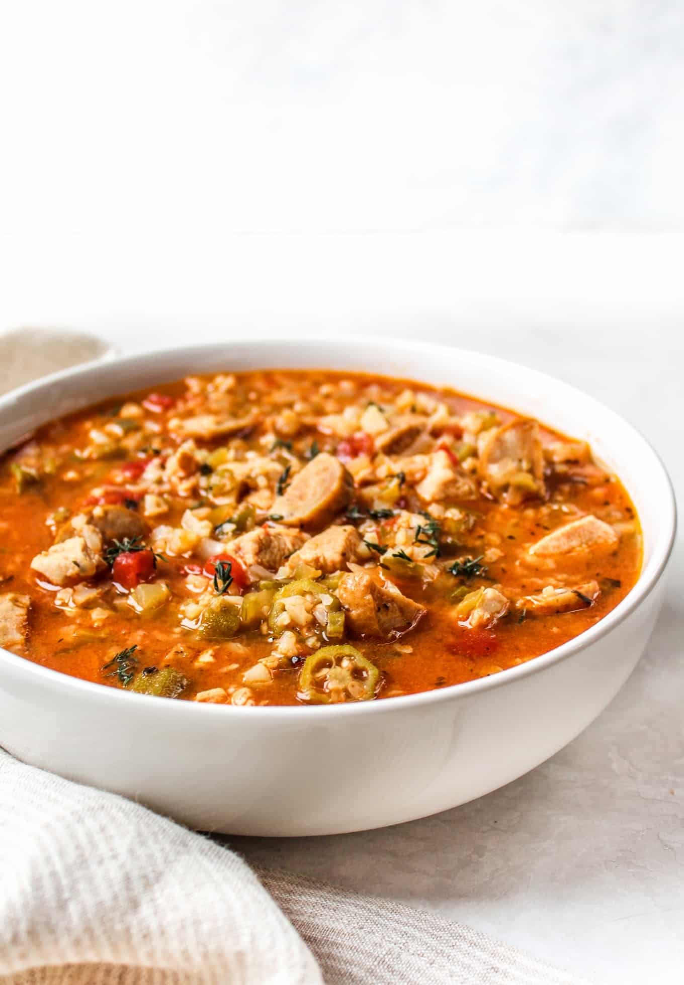 https://thewholecook.com/wp-content/uploads/2020/10/Chicken-Sausage-Gumbo-Soup-by-The-Whole-Cook-vertical.jpg