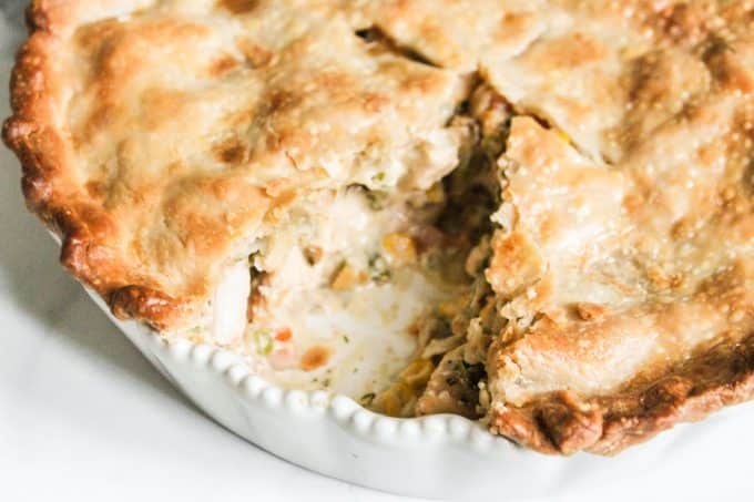 Easy Homemade Chicken Pot Pie with a slice cut out of it