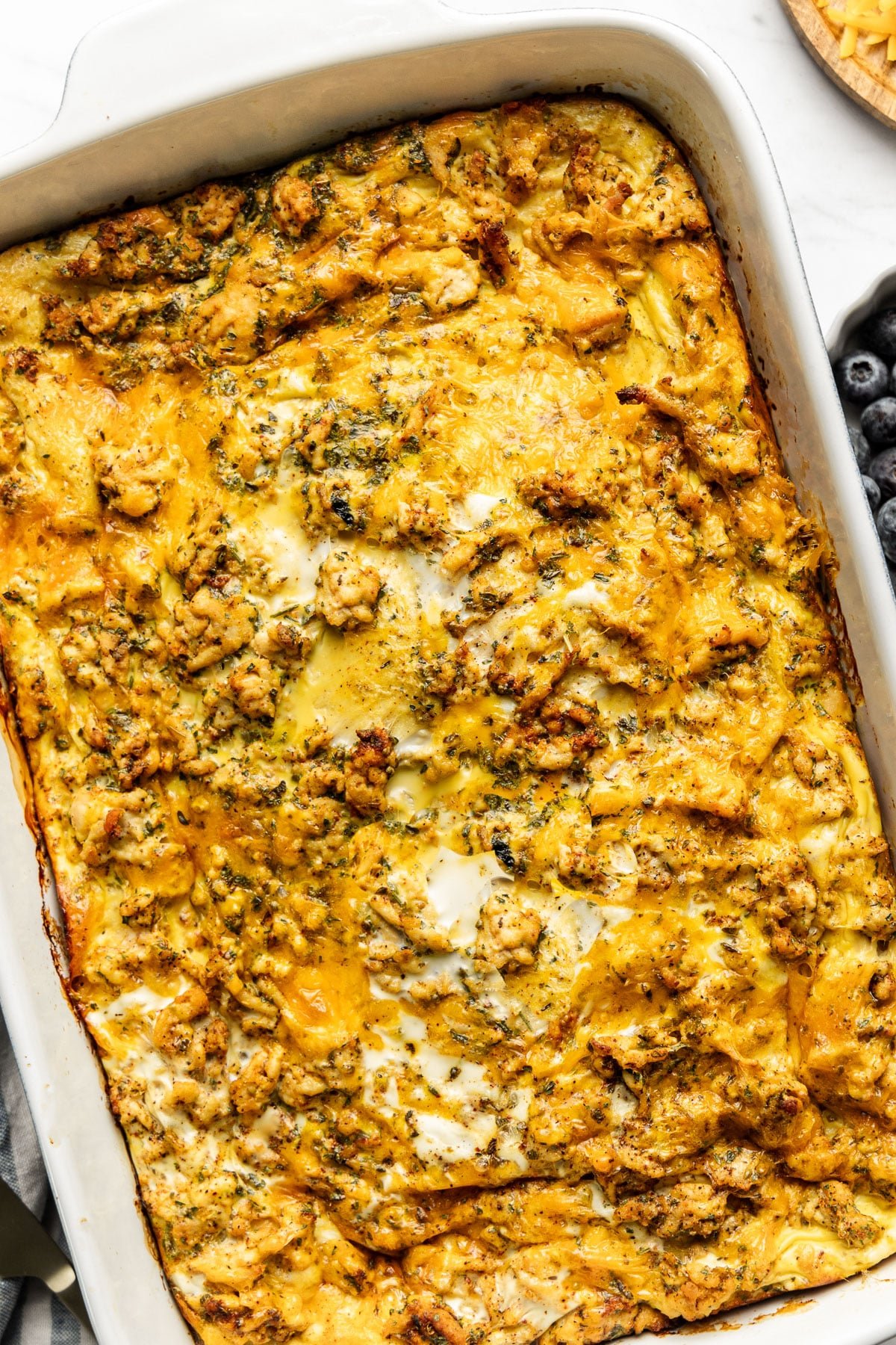 https://thewholecook.com/wp-content/uploads/2022/01/Sausage-and-Cheddar-Breakfast-Casserole-1.jpg