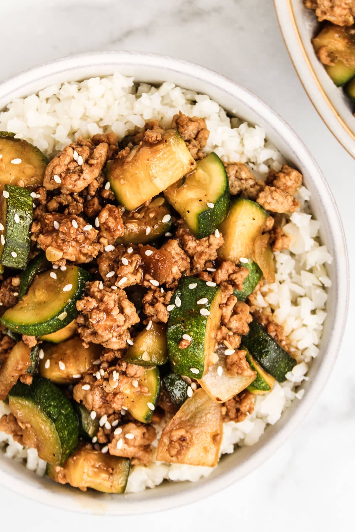 https://thewholecook.com/wp-content/uploads/2023/02/Ground-Chicken-and-Zucchini-Stir-Fry-1-3-1.jpg