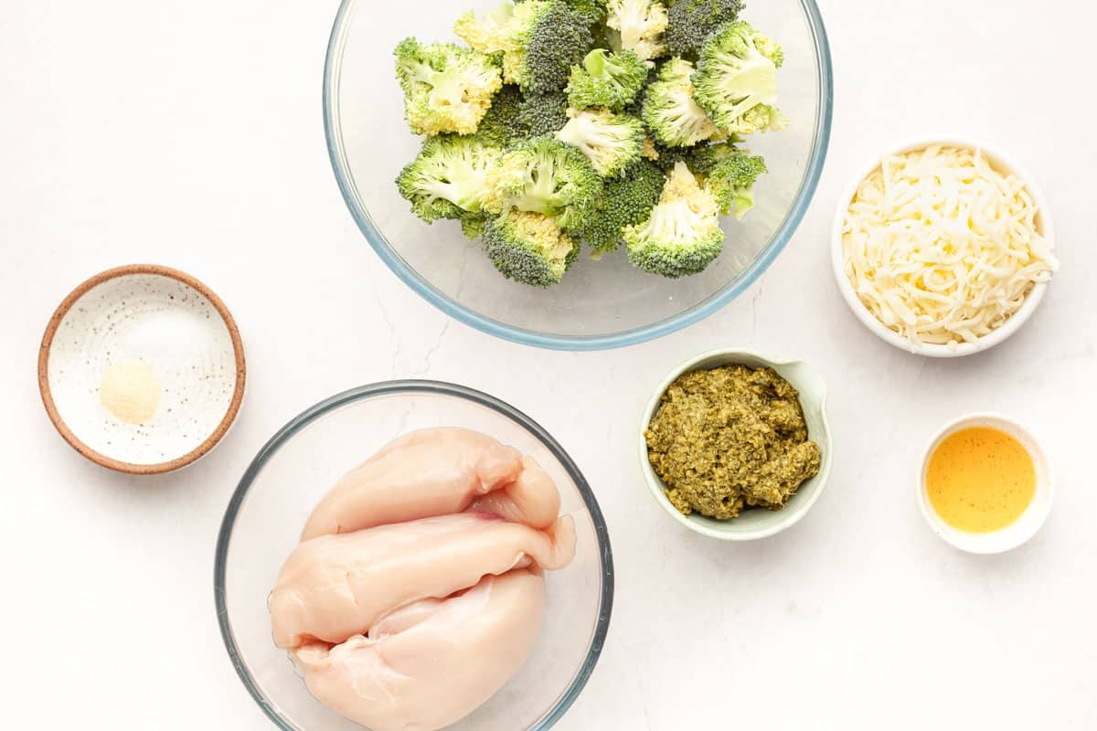 Ingredients for sheet pan pesto chicken with broccoli
